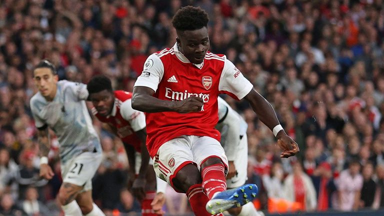 Bukayo Saka scores from the penalty spot to restore Arsenal's lead over Liverpool