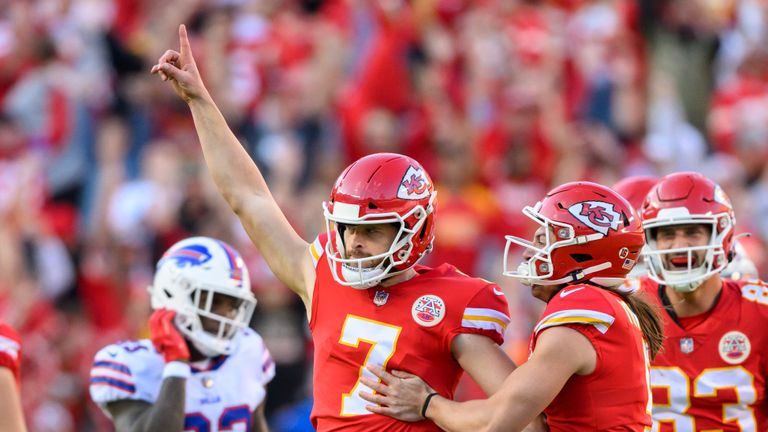Kansas City Chiefs place kicker Harrison Butker (7) celebrates a long field goal with teammate punter Tommy Townsend, right, at the end of the first half to tie the the Buffalo Bills, 10-10, during an NFL football game, Sunday, Oct. 16, 2022 in Kansas City, Mo. (AP Photo/Reed Hoffmann)


