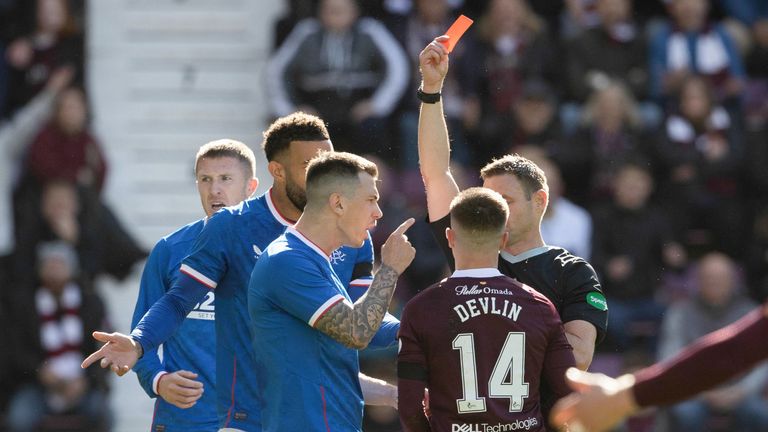 Hearts&#39; Cammy Devlin is shown a straight red card