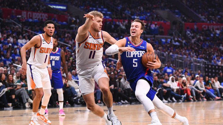 Los Angeles Clippers forward Luke Kennard drives to the basket during a NBA game between the Phoenix Suns and the Los Angeles Clippers on October 23, 2022 at Crypto.com Arena in Los Angeles, CA