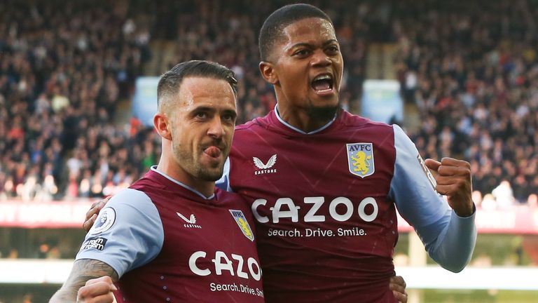 Goal scorers Danny Ings and Leon Bailey celebrate in front of Aston Villa fans