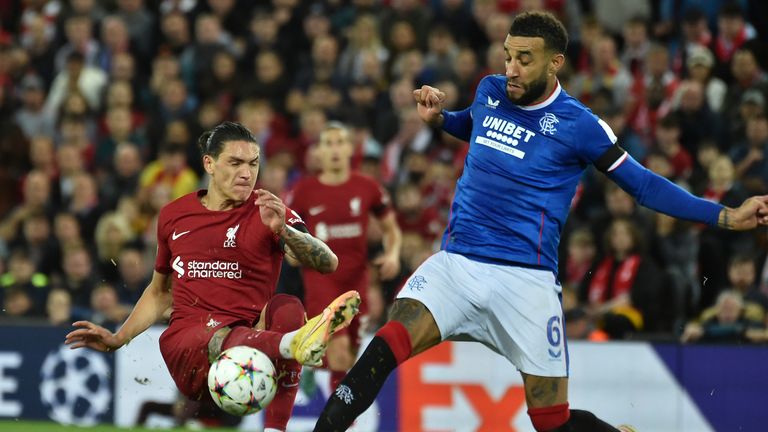 Liverpool&#39;s Darwin Nunez, left, and Rangers&#39; Connor Goldson challenge for the ball 