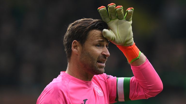 GLASGOW, SCOTLAND - OCTOBER 15: Hibs David Marshall looks dejected after dropping the ball over the line to make it 3-0 during a cinch Premiership match between Celtic and Hibernian at Celtic Park, on October 15, 2022, in Glasgow, Scotland. (Photo by Craig Foy / SNS Group)