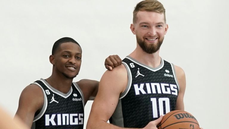 Sacramento Kings guard De'Aaron Fox, left, and center Domantas Sabonis pose for photos during the team media day in September