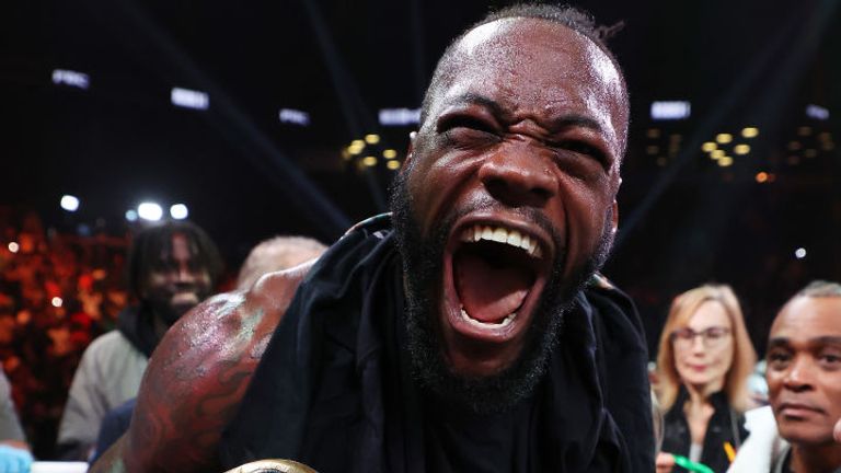 Deontay Wilder celebrates after knocking out Robert Helenius in the first round