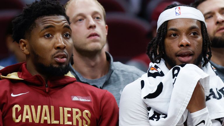Cleveland Cavaliers guard Donovan Mitchell and guard Darius Garland (10) sit on the bench during the second half of a preseason NBA basketball game against the Atlanta Hawks, Wednesday, Oct. 12, 2022, in Cleveland. (AP Photo/Ron Schwane)