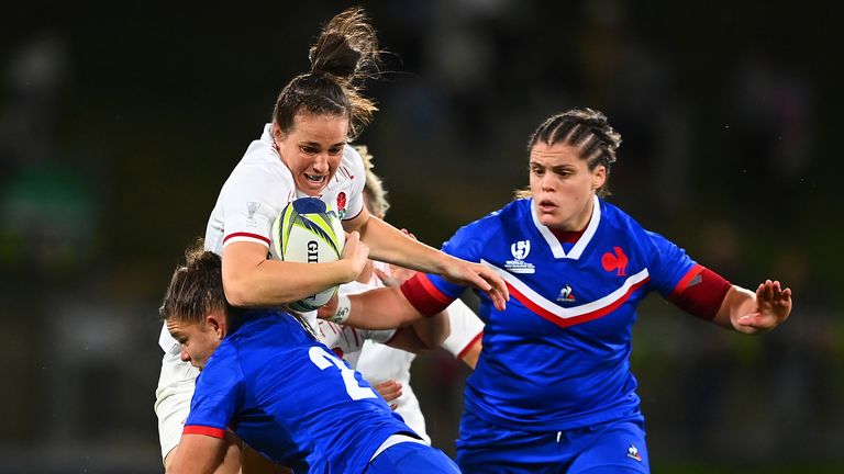 England's Emily Scarratt is tackled during the Pool C Rugby World Cup 2021 match between France and England