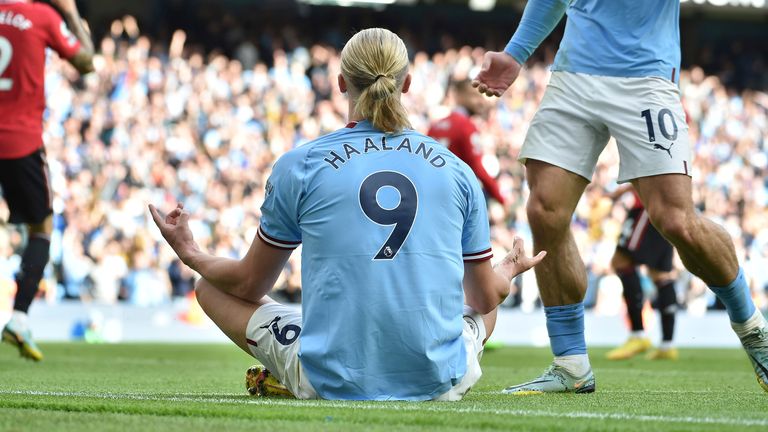 Erling Haaland performs his trademark 'zen' celebration after scoring Man City's fifth goal and his hat trick