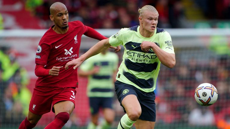 Manchester City's Erling Haaland battles with Liverpool's Fabinho