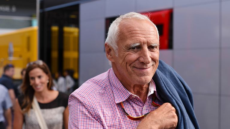 The chairman of Red Bull, Austrian Dietrich Mateschitz, smiles as he leaves the Red Bull Energy Station in the paddock at the Red Bull Ring race track in Spielberg, Austria, 21 June 2014. The 2014 Formula One Grand Prix of Austria will take place on 22 June. 