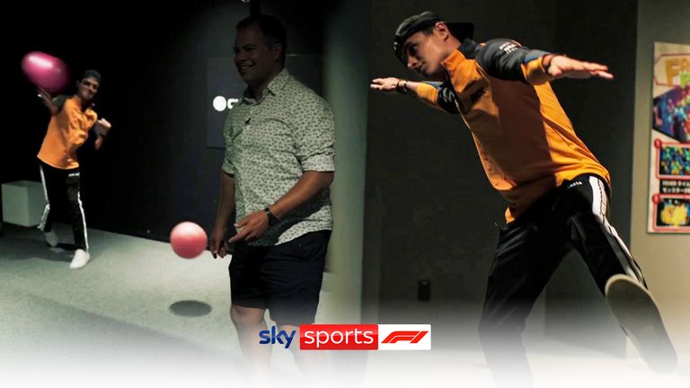 Lando Norris and Ted Kravitz  at a japanese arcade.