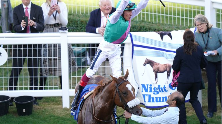 Frankie Dettori with a flying dismount after winning the Dewhurst on Chaldean
