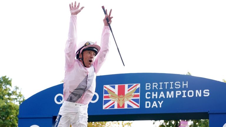 Frankie Dettori performs his trademark flying dismount after victory on Emily Upjohn at Ascot