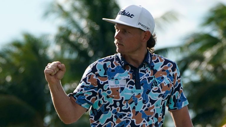 Cameron Smith pumps his fist after a birdie putt against Phil Mickelson on the eighth hole during the first round of the LIV Golf Team Championship in Miami (Associated Press)