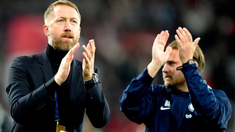 Chelsea&#39;s head coach Graham Potter applauds fans after the Champions League group E soccer match between FC Salzburg and Chelsea at the Salzburg stadium in Salzburg, Austria, Tuesday, Oct. 25, 2022. (AP Photo/Florian Schroetter)