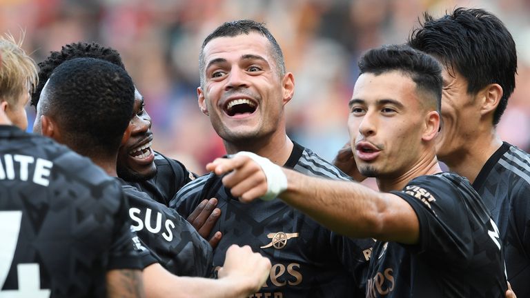A joyous Graint Xhaka celebrates with his team-mates after giving Arsenal the lead at Southampton