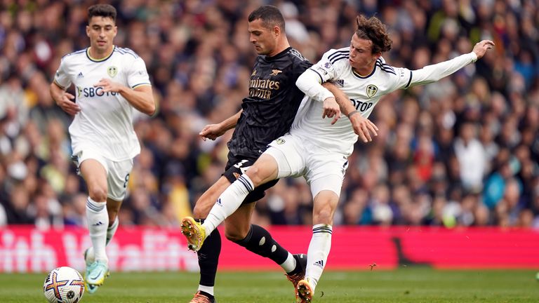 Arsenal's Granit Xhaka holds off Leeds United's Brenden Aaronson