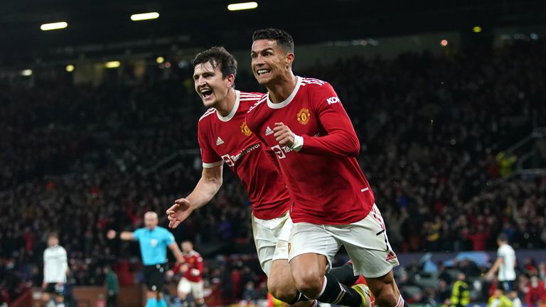 Manchester United&#39;s Cristiano Ronaldo (right) celebrates scoring their side&#39;s third goal of the game with Harry Maguire during the UEFA Champions League, Group F match at Old Trafford, Manchester. Picture date: Wednesday October 20, 2021.