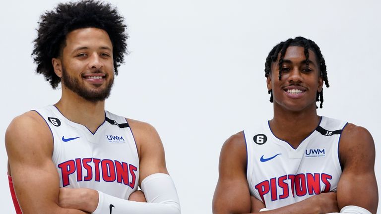 Detroit Pistons guard Cade Cunningham, left, and Jaden Ivey pose during the NBA basketball team's media day in Detroit, Monday, Sept. 26, 2022. (AP Photo/Paul Sancya)