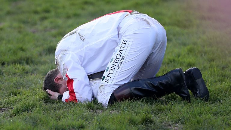 A distraught Jamie Moore after being unseated from Goshen in the 2020 Triumph Hurdle