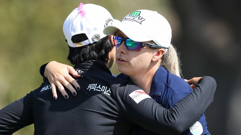 Jodi Ewart Shadoff (right) is congratulated by Narin An (left) after the second round in California