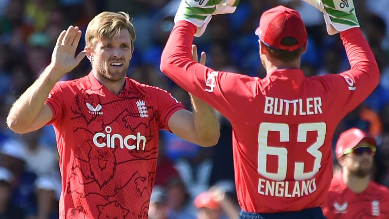 England&#39;s David Willey, left, celebrates with England&#39;s Jos Butler after dismissing India&#39;s Virat Kholi during the third T20 international cricket match between England and India at Trent Bridge in Nottingham, England, Sunday, July 10, 2022. (AP Photo/Rui Vieira)