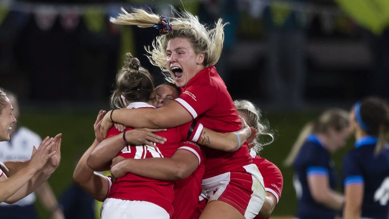 Wales celebrate after Keira Bevan kicked the winning penalty against Scotland in the group stage 