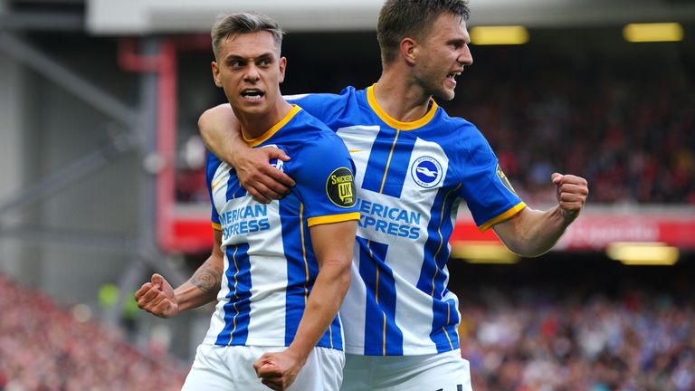 Leandro Trossard celebrates his hat-trick