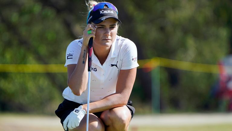 Lexi Thompson looks at her put line on the ninth green during the LPGA The Ascendant golf tournament in The Colony, Texas, Friday, Sept. 30, 2022. (AP Photo/LM Otero)