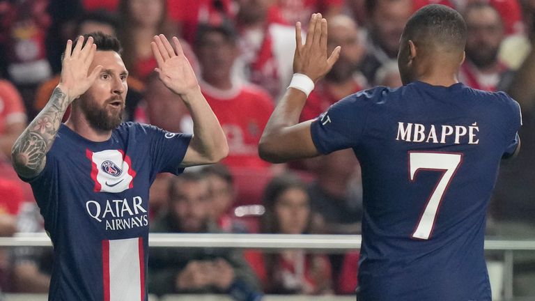 Lionel Messi celebrates with Kylian Mbappe after scoring for PSG against Benfica 