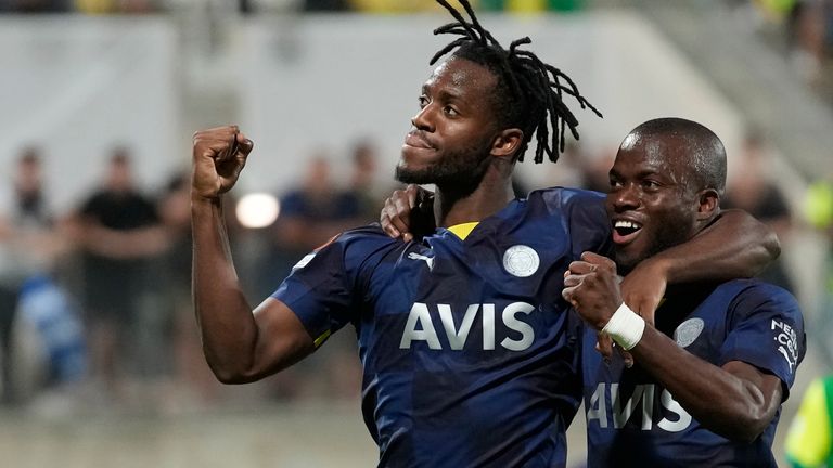 Fenerbahce's Michy Batshuayi, left, celebrates with his teammate Enner Valencia, after scoring from the penalty spot