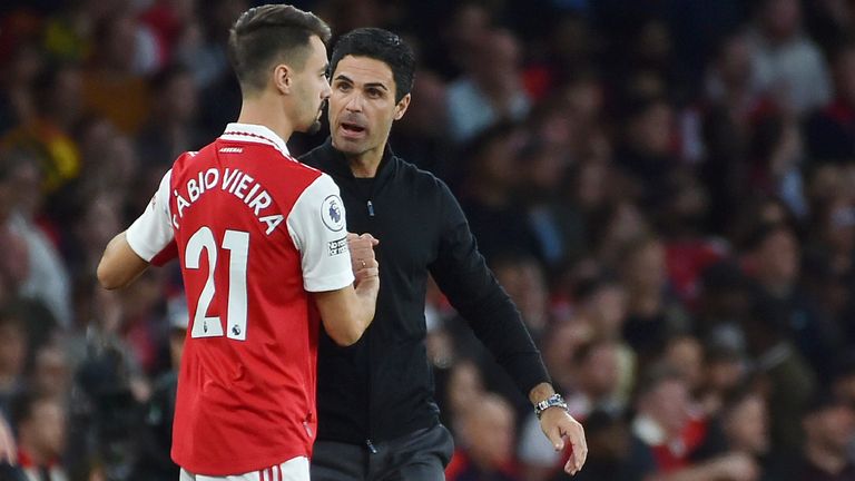 Mikel Arteta talks with Fabio Vieira as Arsenal hold onto a 3-2 lead against Liverpool