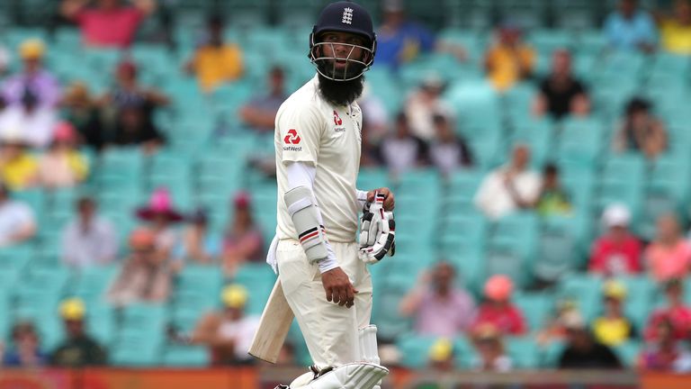 England's Moeen Ali walks off after he was trapped LBW by Australia's Nathan Lyon during the last day of their Ashes cricket test match in Sydney, Monday, Jan. 8, 2018. (AP Photo/Rick Rycroft)..