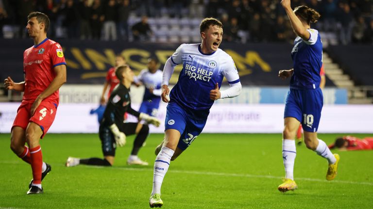 Nathan Broadhead celebrates scoring for Wigan against Blackburn