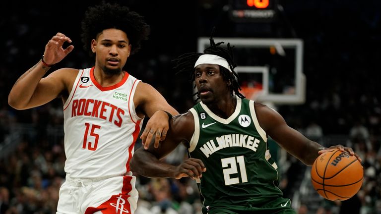 Milwaukee Bucks&#39; Jrue Holiday tries to get past Houston Rockets&#39; Daishen Nix during the second half of an NBA basketball game Saturday, Oct. 22, 2022, in Milwaukee. (AP Photo/Morry Gash)


