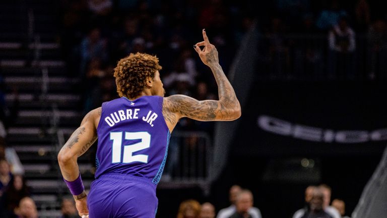 Charlotte Hornets guard Kelly Oubre Jr. (12) celebrates during the first half of an NBA basketball game against the Golden State Warriors, Saturday, Oct. 29, 2022, in Charlotte, N.C.