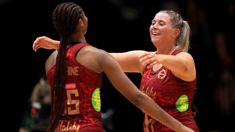 England's Eleanor Cardwell congratulates her team-mate on account of her international debut 