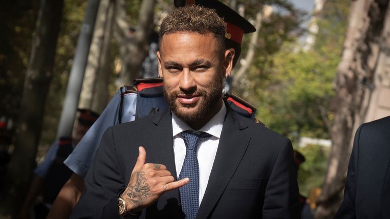 Neymar on his way out of the trial on Tuesday