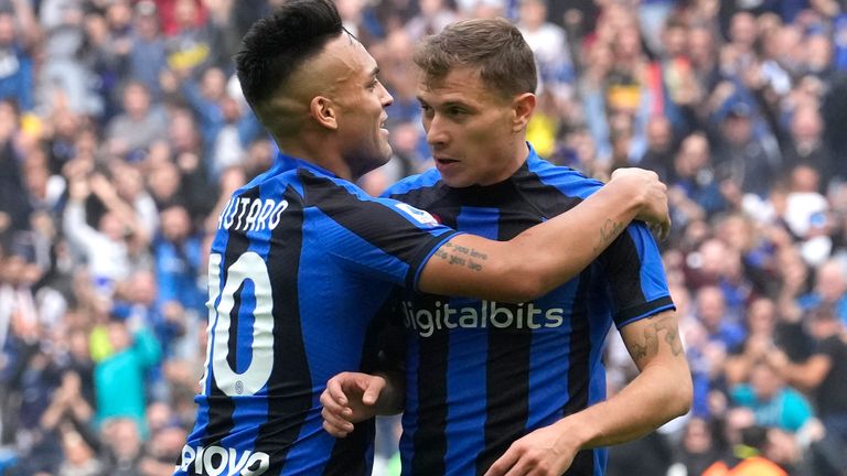 Inter Milan&#39;s Nicolo Barella celebrates with his teammate Lautaro Martinez