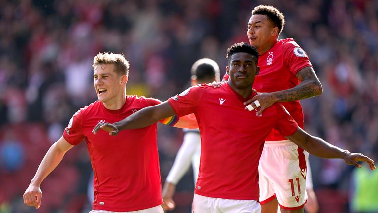 Nottingham Forest's Taiwo Awoniyi celebrates with team-mates after scoring against Liverpool