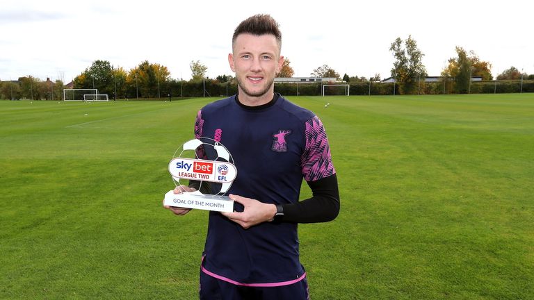 Mansfield Town&#39;s Ollie Clarke.Wednesday 19th October 2022.RH Academy, Mansfield, England..Mansfield Town&#39;s Ollie Clarke receives the Sky Bet League Two Goal of the Month trophy for his goal at Doncaster Rovers in September...Picture by Dan Westwell