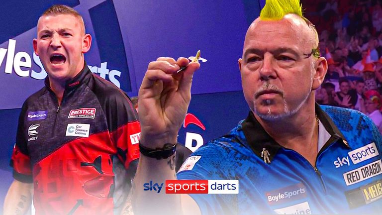 Nathan Aspinall and Peter Wright playing in the quarter-finals of the World Grand Prix Darts