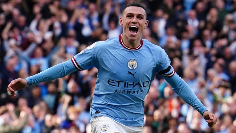 Phil Foden celebrates making it 4-0