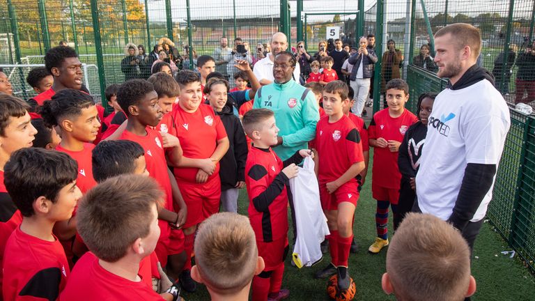 Eric Dier with children at Rap-Aid Youth Football Club (credit: Sported)