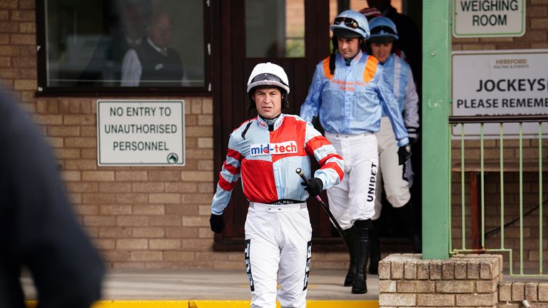 Dunne leaves the weighing room at Hereford as he returned to the track for the first time in 10 months