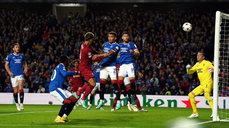 Roberto Firmino heads Liverpool's equaliser against Rangers in the Champions League at Ibrox