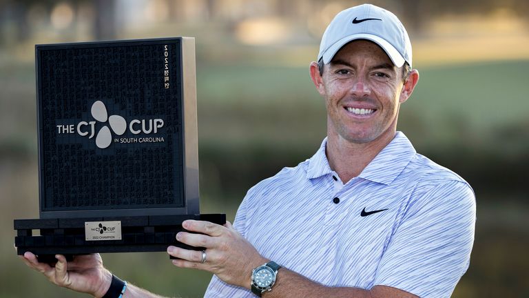 Rory McIlroy, of Northern Ireland, holds the winning trophy after the final round of the CJ Cup golf tournament Sunday, Oct. 23, 2022, in Ridgeland, S.C. (AP Photo/Stephen B. Morton)