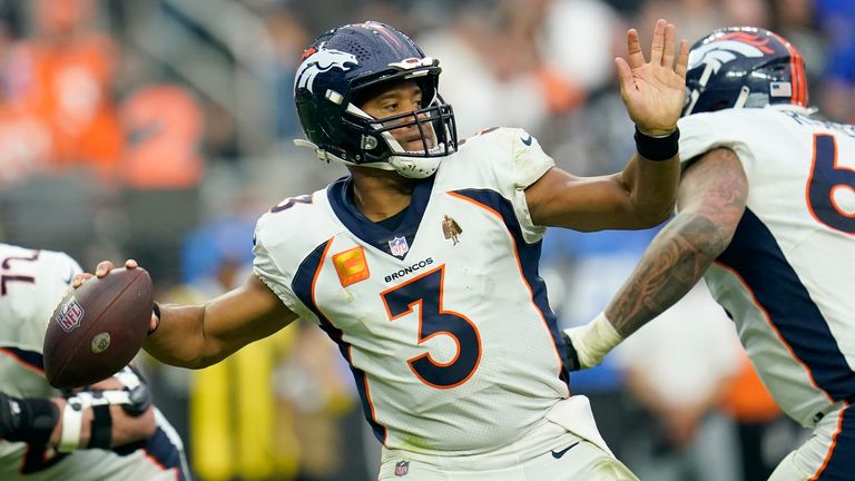 Las Vegas Raiders cornerback Amik Robertson (21) runs back a fumble for a touchdown against the Denver Broncos during the first half of an NFL football game, Sunday, Oct. 2, 2022, in Las Vegas. 