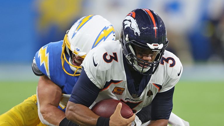 Denver Broncos quarterback Russell Wilson is sacked during their overtime defeat to the Los Angeles Chargers