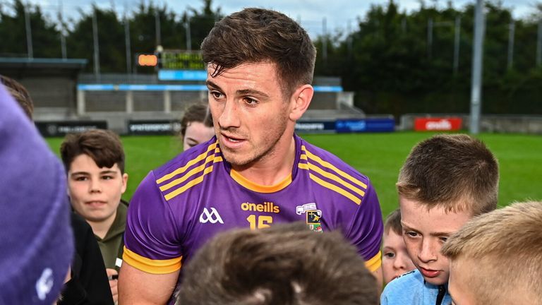 2 October 2022; Shane Walsh of Kilmacud Crokes signs autographs for supporters after the Dublin County Senior Club Football Championship Semi-Final match between Thomas Davis and Kilmacud Crokes at Parnell Park in Dublin. Photo by E..in Noonan/Sportsfile